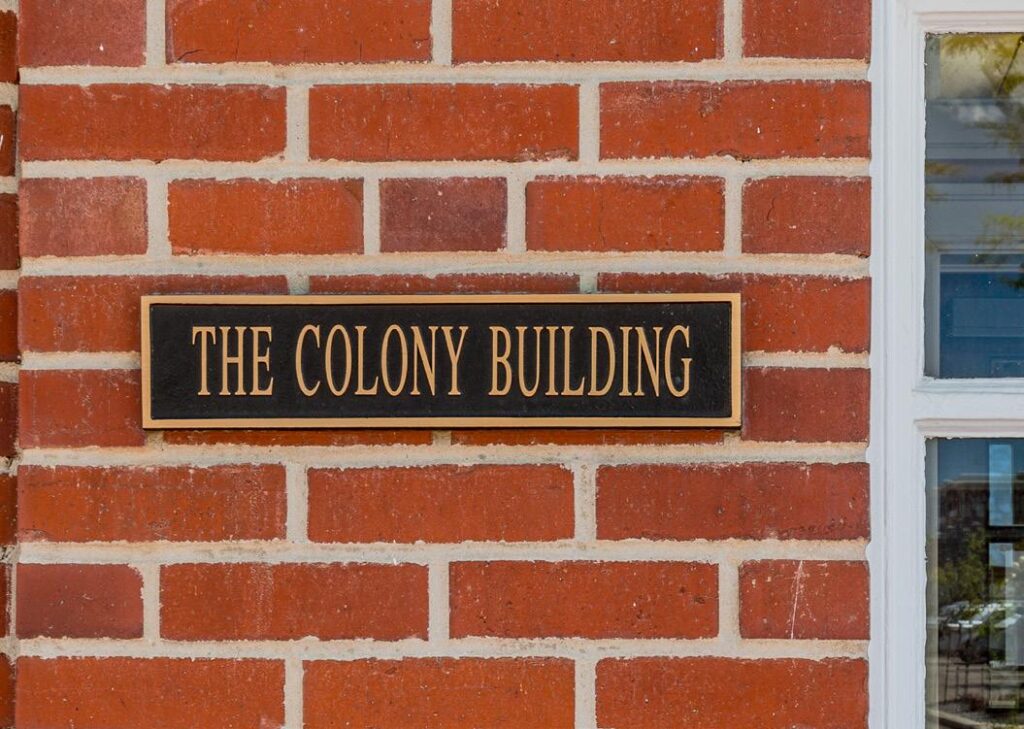 Building sign with text "The colony building" in Cheyenne, Wyoming.